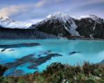 Neuseeland Gebirgszug und See - Neuseeland-Urlauber benötigen künftig eine Einreisegenehmigung.