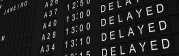 Anzeigetafel mit verspäteten Flügen