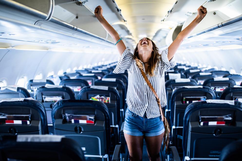 Flugzeug+Frau+freuen