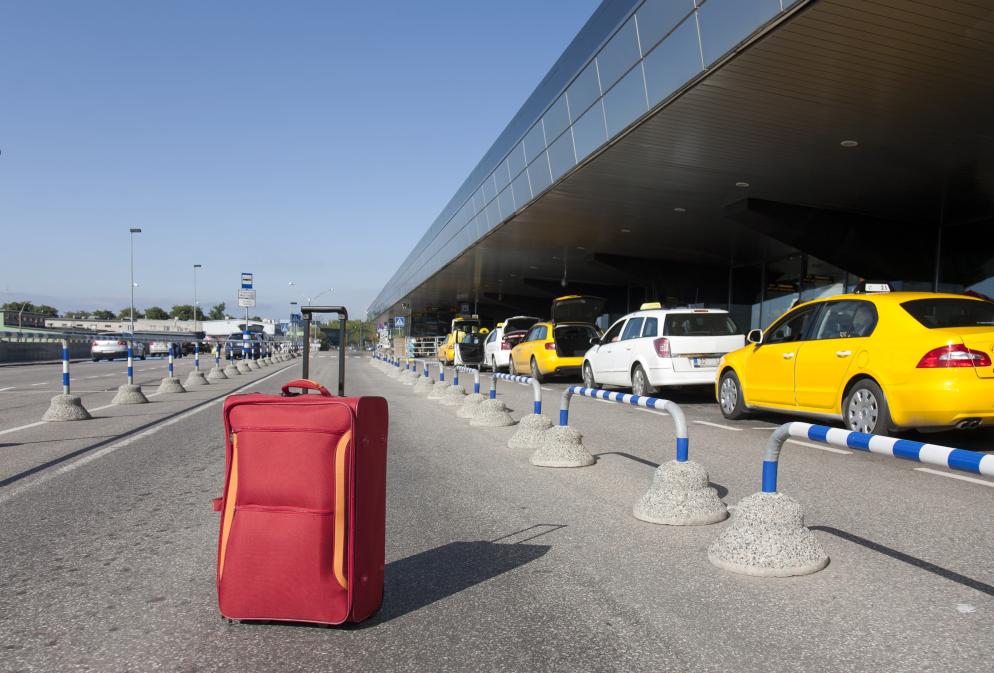 Taxi+Flughafen+Koffer